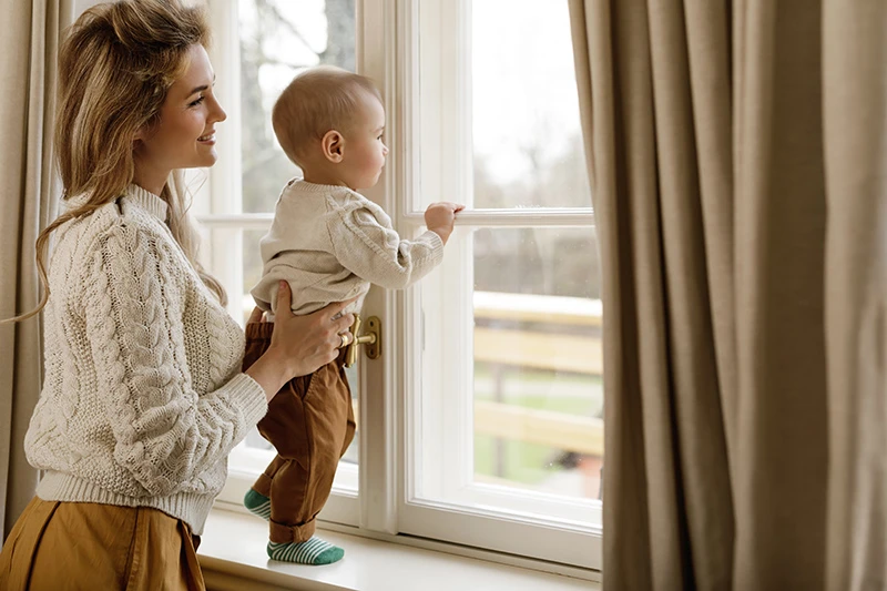 Woman and Child at Window