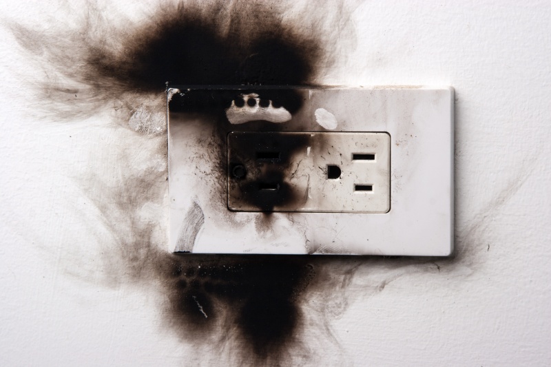 burnt electrical outlet warning signs